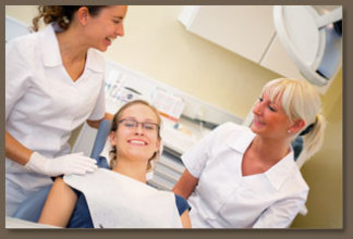 happy dental patient with nurses